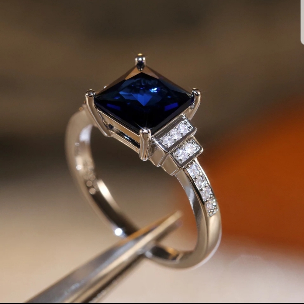 New princess blue sapphire ring with diamo…